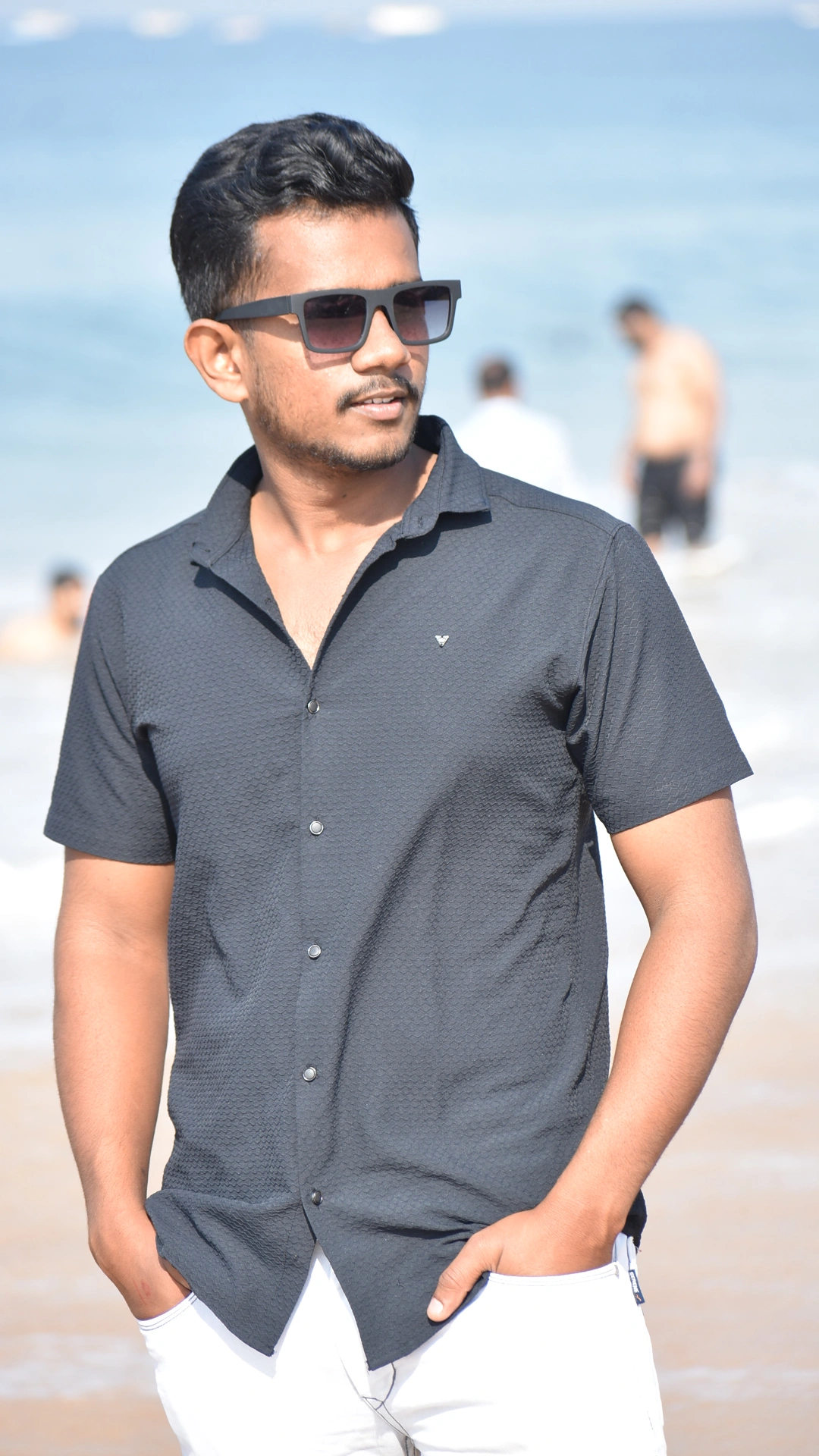 Portrait of Kiran Y at the beach
